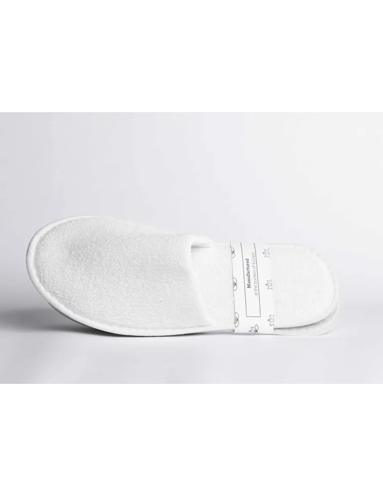 Witte katoenen badstof schoenen voor hotels